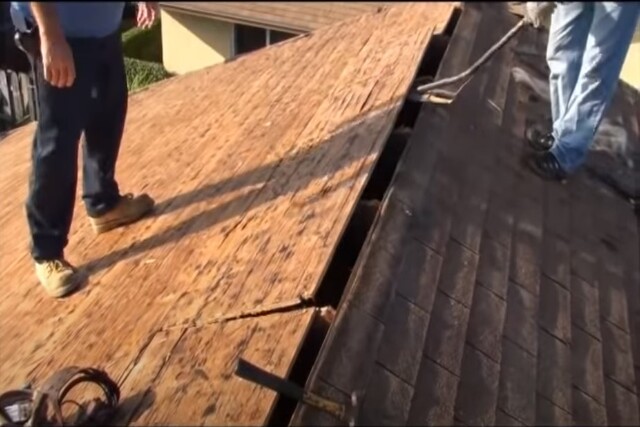 Kitchener Roofing workers doing re-roofing on a home